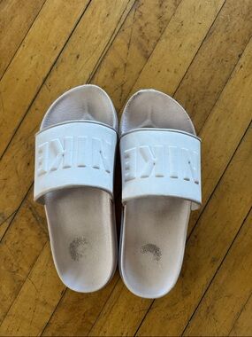 Nike White/Pale Pink Slide Sandals with Embossed Logo